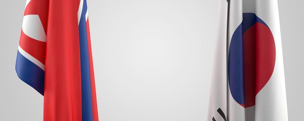 Las banderas de Corea del Norte y Corea del Sur - Sputnik Mundo