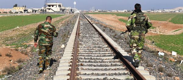 Los militares del Ejército en el ferrocarril en Siria (imagen referencial) Los militares del Ejército en el ferrocarril en Siria (imagen referencial) - Sputnik Mundo