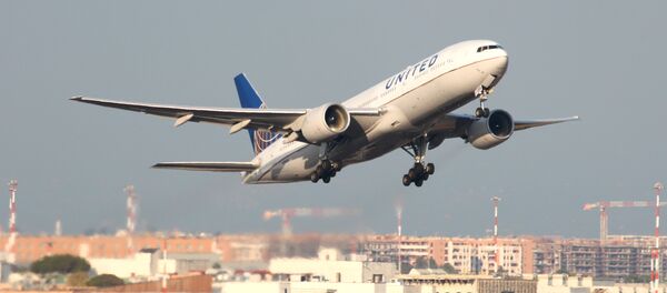 Un Boeing 777 de United Airlines Un Boeing 777 de United Airlines - Sputnik Mundo
