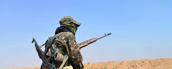 Combatiente de las Unidades kurdas de Protección Popular (archivo) - Sputnik Mundo