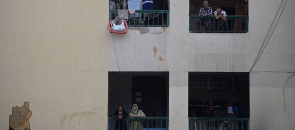 Refugiados palestinos del campo Yarmuk en Damasco, Siria (archivo) - Sputnik Mundo