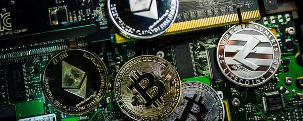 Criptomonedas (imagen referencial) - Sputnik Mundo