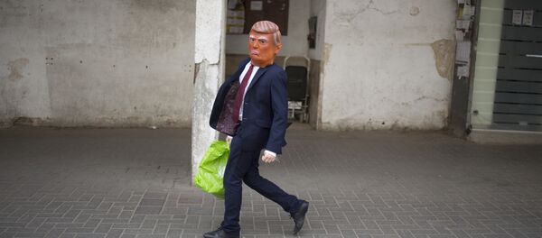 Un niño vestido de Donald Trump, foto de archivo - Sputnik Mundo