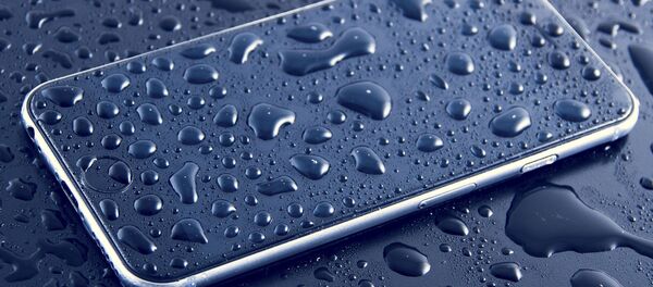 Un celular (imagen ilustrativa) - Sputnik Mundo