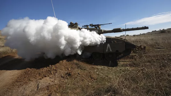 Tanque israelí durante unos ejercicios militares en los Altos de Golán (archivo)