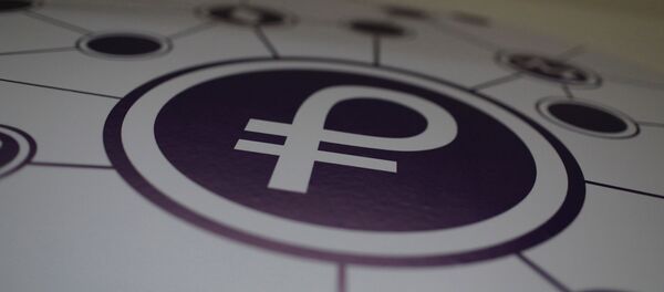Logo de la nueva criptomoneda venezolana Petro Logo de la nueva criptomoneda venezolana Petro - Sputnik Mundo