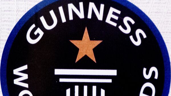 El logo del Libro Guinness de los Records - Sputnik Mundo