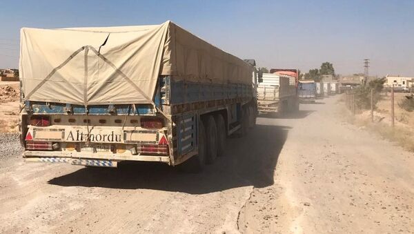 Convoy humanitario en Siria Convoy humanitario en Siria - Sputnik Mundo