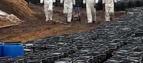 Personas con trajes de protección (imagen ilustrativa) - Sputnik Mundo