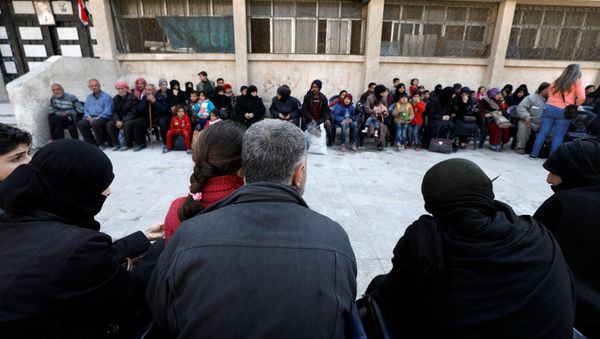 Evacuación de civiles en Guta Oriental, Siria Evacuación de civiles en Guta Oriental, Siria - Sputnik Mundo
