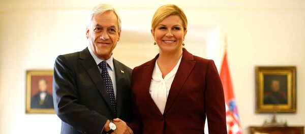 El presidente de Chile, Sebastián Piñera, junto a la presidenta de Croacia, Kolinda Grabar-Kitarović - Sputnik Mundo