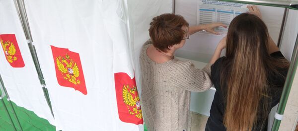 Un colegio electoral en Rusia, imagen referencial Un colegio electoral en Rusia, imagen referencial - Sputnik Mundo