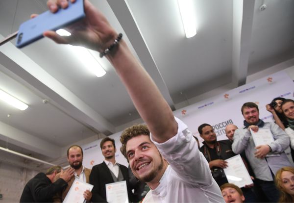 Los participantes del Concurso Internacional de Fotoperiodismo Andréi Stenin  - Sputnik Mundo