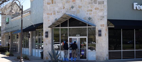 Un centro logístico de la compañía de mensajería FedEx, junto al aeropuerto de Austin - Sputnik Mundo