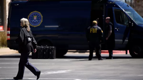 Agentes del FBI en el lugar de las explosiones en Austin, EEUU - Sputnik Mundo