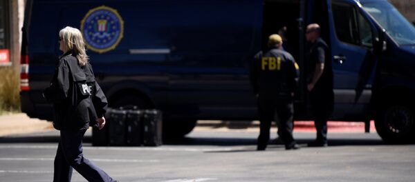 Agentes del FBI en el lugar de las explosiones en Austin, EEUU - Sputnik Mundo