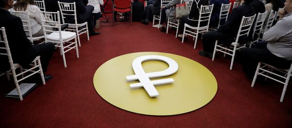 El logo de la criptomoneda petro (archivo) - Sputnik Mundo
