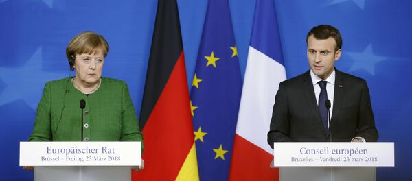 La canciller alemana, Angela Merkel, y el presidente de Francia, Emmanuel Macron - Sputnik Mundo