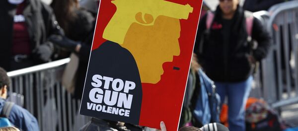 Manifestación masiva contra la violencia armada en EEUU Manifestación masiva contra la violencia armada en EEUU - Sputnik Mundo