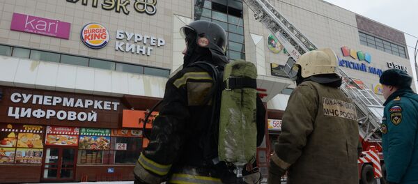 El incendio en un centro comercial de la ciudad rusa de Kémerovo El incendio en un centro comercial de la ciudad rusa de Kémerovo - Sputnik Mundo