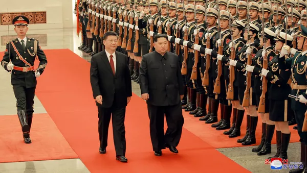 El presidente chino, Xi Jinping, y el líder norcoreano, Kim Jong-un