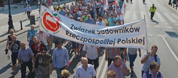 La acción de los jardineros en Varsovia contra las sanciones antirrusas - Sputnik Mundo