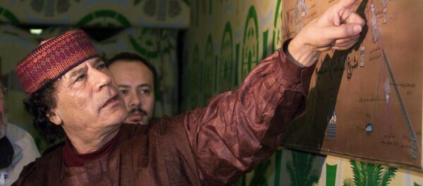 Muamar Gadafi, expresidente de Libia - Sputnik Mundo