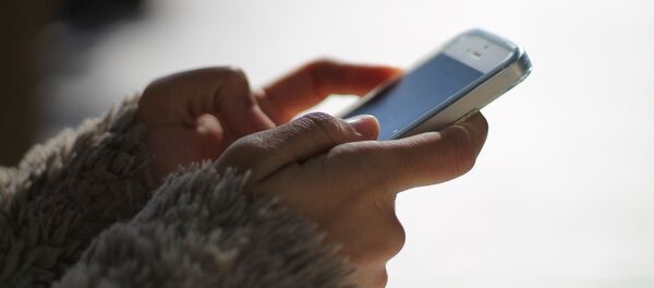 Un smartphone - Sputnik Mundo