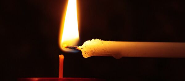 Una vela (imagen referencial) - Sputnik Mundo