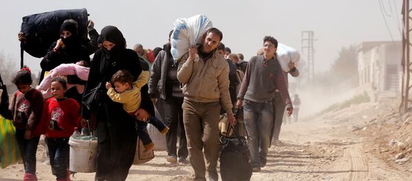 La evacuación de los civiles de Guta Oriental, Siria - Sputnik Mundo