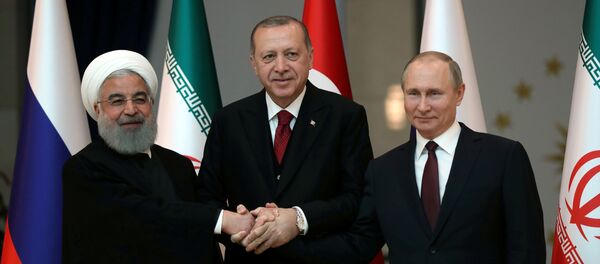 Los presidentes de Irán, Turquía y Rusia, Hasán Rohaní, Recep Tayyip Erdogan y Vladímir Putin - Sputnik Mundo