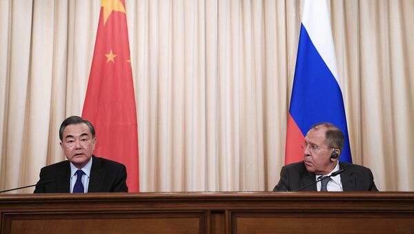 Ministro de Asuntos Exteriores de China, Wang Yi, y su homólogo ruso, Serguéi Lavrov Ministro de Asuntos Exteriores de China, Wang Yi, y su homólogo ruso, Serguéi Lavrov - Sputnik Mundo