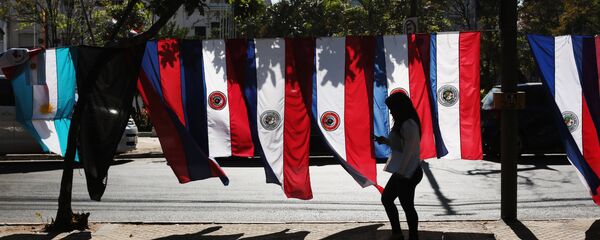 Banderas de Paraguay en Asunción - Sputnik Mundo
