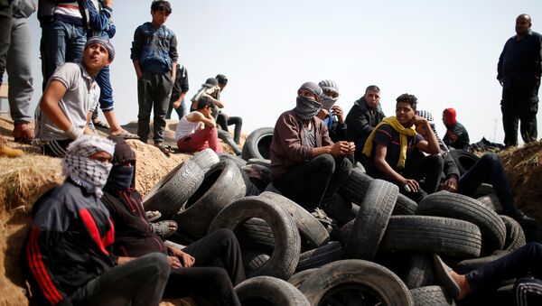 Protestas de los palestinos de Gaza en la frontera con Israel Protestas de los palestinos de Gaza en la frontera con Israel - Sputnik Mundo