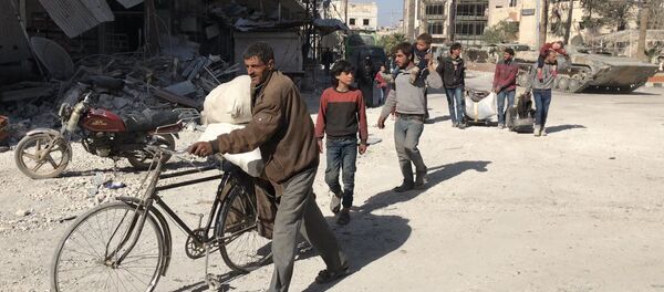 Los habitantes en Guta Oriental (archivo) - Sputnik Mundo