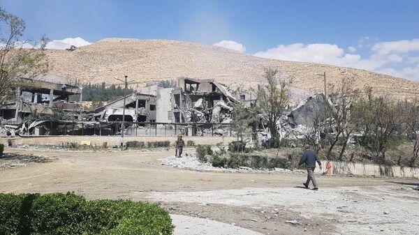 Las consecuencias del bombardeo del municipio de Barzeh - Sputnik Mundo