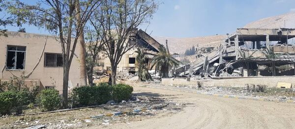 Las ruinas de un edificio en el municipio de Barzeh - Sputnik Mundo
