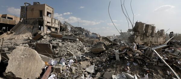 Consecuencias del bombardeo en Damasco, Siria - Sputnik Mundo