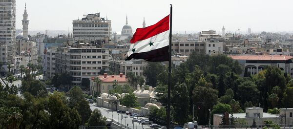 La bandera de Siria en Damasco - Sputnik Mundo