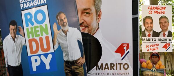 Los carteles con los retratos de los candidatos a la presidencia de Paraguay Los carteles con los retratos de los candidatos a la presidencia de Paraguay - Sputnik Mundo