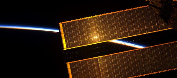 La vista desde la EEI, el amanecer - Sputnik Mundo