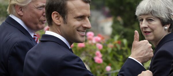 Donald Trump, Emmanuel Macron y Theresa May durante el foro G7 en Taormina (Italia), 26 de mayo de 2017 - Sputnik Mundo