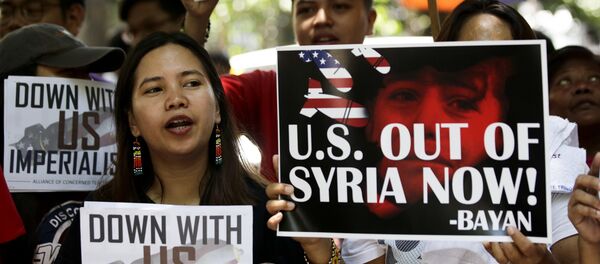 Marcha en contra de los bombardeos de Siria en Manila (Filipinas), 17 de abril de 2018 Marcha en contra de los bombardeos de Siria en Manila (Filipinas), 17 de abril de 2018 - Sputnik Mundo