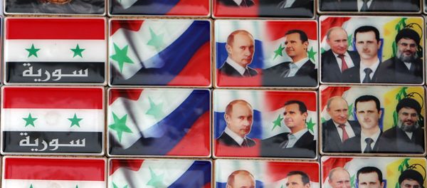Los imanes con retratos del presidente ruso, Vladímir Putin, y presidente sirio, Bashar Asad - Sputnik Mundo
