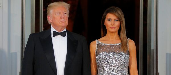 El presidente de EEUU, Donald Trump y su esposa, Melania - Sputnik Mundo