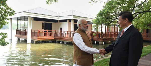 Primer ministro de la India, Narendra Modi, y presidente de China, Xi jinping Primer ministro de la India, Narendra Modi, y presidente de China, Xi jinping - Sputnik Mundo