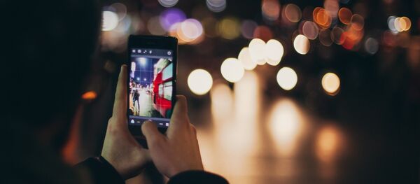 Un teléfono móvil Un teléfono móvil - Sputnik Mundo