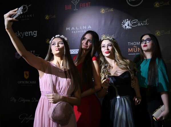 La etapa final del concurso Miss y Missis Rusia Tierra 2018 La etapa final del concurso Miss y Missis Rusia Tierra 2018 - Sputnik Mundo