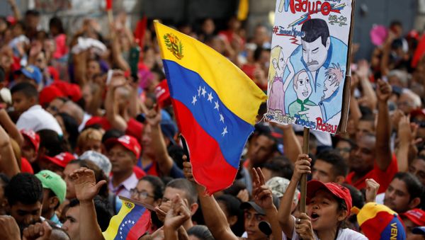Los partidarios del presidente de Venezuela, Nicolás Maduro Los partidarios del presidente de Venezuela, Nicolás Maduro - Sputnik Mundo