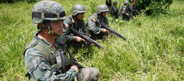 Ecuadorian soldiers guard the border with Ecuador in Narino, Colombia - Sputnik Mundo